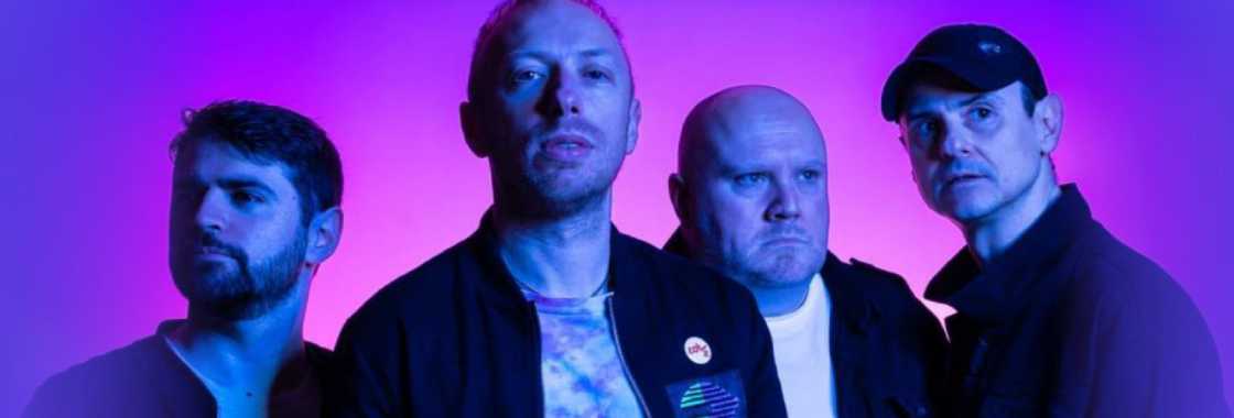 The band members of Ultimate Coldplay against a pink and purple background